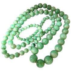 GIA Natural Jade Bead necklace. The Natural Translucent Mottled Green Report: 5161522933 102 Bead count 10.20 - 4.30mm 26 Inches (wearable length) Green Jade Necklace, Diamond Flower Pendant, Jade Bead Necklace, Purple Jade, White Gold Chains, Gold Pearl Necklace, Jade Necklace, Flower Pendant Necklace, White Gold Necklaces