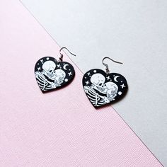 Skeleton lover dangle earrings. ⭐️ Wooden skeleton charms ⭐️ Choice of hooks (for normal pierced ears) or hoops (for stretched ears/gauges) ⭐️ Made with hypoallergenic earring hooks or hoops ⭐️ Free UK delivery Black Themed Jewelry For Valentine's Day, Themed Black Jewelry For Valentine's Day, Handmade Themed Jewelry For Valentine's Day, Valentine's Day Heart Shaped Themed Jewelry, Valentine's Day Themed Heart Jewelry, Valentine's Day Heart-shaped Themed Jewelry, Black Novelty Jewelry For Valentine's Day, Themed Heart-shaped Jewelry Gift, Gothic Dangle Heart Earrings For Gift