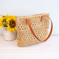 In Stock Fast Shipping From Los Angeles Patterned straw woven tote. Great for tropical vacation. New summer beach look. This stylish tote is perfect for those beachy days, crafted with quality straw for a strong and lightweight bag. With this patterned accessory, you can enjoy your summer days with your favorite outfit in confidence. Zipper closureFully linedPu leather handlePocket insideSize approximately 13"H x 15"W x 1"D12" handle drop Designer Style ID: 8720 Patterned Straw Woven Tote Bag, Retro Vibes, Summer Bag, Everyday Shoulder Bag, Beach Bag Lightweight Beige Jute Straw Bag, Lightweight Straw Bag For Everyday, Lightweight Beige Straw Bag For Travel, Lightweight Beige Straw Beach Bag, Lightweight Beige Rectangular Straw Bag, Summer Lightweight Straw Crochet Bag, Lightweight Straw Crochet Bag For Summer, Lightweight Rectangular Beige Straw Bag, Lightweight Summer Crochet Bag Made Of Straw