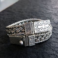 Men's Sterling Silver Fleur De Lis Wide Braided Bracelet Metal Type: 925 Sterling Silver Gender: For Men Style: Punk Width: 11 mm Thickness: 5 mm Length: 19 cm / 20 cm / 21 cm / 22 cm / 23 cm Weight: 68 g / 72 g / 74 g / 76 g / 78 g Mens Sterling Silver Jewelry, Mens Silver Jewelry, Silver Chain For Men, Bracelets Silver, Mens Bracelet Silver, Mens Silver Necklace, Rings Silver, Silver Chains, Great Gifts For Men