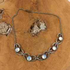 "This is a beautiful vintage oplatite necklace, it's in a verry good condition.  - All the items in my store are vintage or antique Will be shipped registered in a gift packaging with track and trace. Take a look around for other fun and inspiring pieces: https://www.etsy.com/shop/Factory23 Please know that the items for sale in my shop are vintage pre-owned items, not in their original condition and may show signs of wear due to age and use. There may be minor flaws such as light scuffs, tarnis Vintage Round Metal Necklace, Elegant Patina Necklaces As Gift, Elegant Patina Necklaces For Gifts, Vintage Metal Necklace, Vintage Metal Necklace With Patina, Vintage Patina Metal Necklace, Vintage Antique Finish Necklace, Elegant Oval Jewelry With Patina, Elegant Patina Jewelry For Weddings