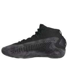 a pair of black sneakers with mesh detailing on the upper and side, against a white background