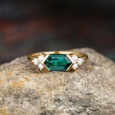 Jewelry Information: ♡ Handmade, high-quality item ♡ Material: 925 Sterling Silver/ Platinum/ SOLID 10K/14K/18K GOLD ( can be made in yellow/white/rose gold ) ♡ Center stone: Lab Created Green Emerald ♡ Size/Weight: 5*9mm, 1.2ct ♡ Cut: Hexagon Cut ♡ Side stones: Moissanite ♡ Total carat weight: About 0.21ct ♡ Clarity: VS ♡ Color: EF ♡ Cut: Round Cut ♡ Band Width: Around 1.6mm ♡Please choose the moss agate you like and remember the number, and select the corresponding moss agate number in the options when you place your order. ✶PRODUCTION✶ We are jewelry artisans and manufacturers. Every Jewelry is made from the very scratch, and made by hand and carefully polished especially for you. ✶Each order comes carefully packaged & gift wrapped. ------Every purchase includes a beautiful jewelry boxe 14k Gold Asscher Cut May Birthstone Ring, Octagon Yellow Gold Emerald Ring With Vvs Clarity, 14k Gold Jewelry With Asscher Cut Gemstone, Emerald Gemstone Cluster Ring In Emerald Cut, Octagon White Gold Emerald Ring, 14k Gold Cluster Ring With Emerald Cut Gemstone, Emerald Cluster Ring With Emerald Cut, Emerald Cut Gemstone Cluster Ring In 14k Gold, 14k White Gold Emerald Cut Birthstone Ring