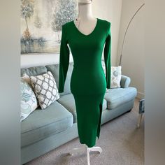 New With Tags Chic Green Knit Midi Dress, Chic Green V-neck Sweater Dress, Elegant Green Knit Midi Dress, Green Knit Midi Dress For Spring, Green Knit Party Dress, Green Stretch Knit Sweater Dress, Green Sweater Dress For Fall Party, Stretch Knit Green Sweater Dress, Chic Green Knit Sweater Dress