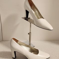 A Magnificent Pair Of Brand New/Never Worn (Without Tags) Size 6.5 (37 Eu) Suzanne Rae White Heels Classic Formal Court Shoes With 4-inch Heel, Classic White Heels With Medium Width, Classic Formal Heels With Almond Toe, Classic White Round Toe Heels, Classic Almond Toe Court Shoes For Formal Occasions, Classic Almond Toe Court Shoes For Formal Events, Elegant Spring Court Shoes With Reinforced Heel, Formal Court Shoes With Almond Toe And Medium Width, Classic White Court Shoes