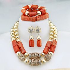 Elevate your Nigerian wedding or party look with this Bead Jewelry. Handcrafted with care, these jewelry pieces add a touch of color and cultural significance to your ensemble, making you stand out with traditional elegance. Traditional Coral Beaded Necklaces With Polished Beads, Traditional Coral Beaded Necklaces, Traditional Coral Gemstone Beads, Traditional Large Beads Jewelry For Ceremonies, Traditional Round Beads Jewelry For Ceremonies, Traditional Jewelry For Ceremonies With Round Beads, Traditional Jewelry With Large Beads For Ceremonies, Traditional Jewelry With Round Beads For Ceremonies, Traditional Round Beaded Jewelry For Ceremonies