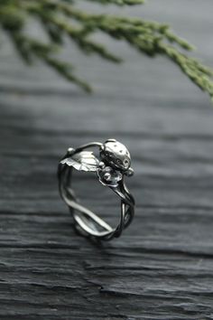 ITEM DESCRIPTION: Weight - 3 g. Materials: silver 925 I can make it any size you want - just mark your size in the order Strawberry is a beautiful berry not only for dessert but also for jewelry. So I made this silver ring with a berry, a flower, and a strawberry leaf. It is so elegant, elegant and joyful, like the beginning of summer in the garden. I am sure that with this ring you will always have a good mood and many compliments. This handmade ring will come to you in a gift box - ready for g Nature-inspired Silver Ring Stamped 925, Nature-inspired Round Flower Ring For Anniversary, Nature-inspired Sterling Silver Ring, Nature-inspired Sterling Silver Ring Stamped 925, Delicate Silver Ring With Rose Cut Diamonds, Dainty Silver Jewelry With Rose Cut Diamonds, Nature-inspired White Gold Flower Ring, Nature-inspired Jewelry With Rose Cut Diamonds As A Gift, Nature-inspired Silver Open Flower Ring