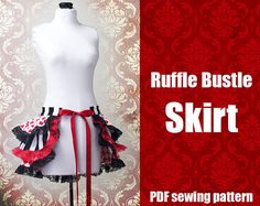 a white dress with red and black ruffles on it