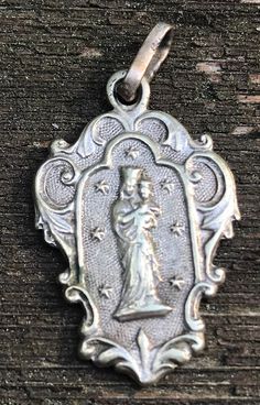 Vintage Notre Dame OUR LADY of AERBODE Religious Medal Pendant on 18" sterling silver rolo chain Commemorative Silver Charm Jewelry, Commemorative Silver Jewelry With Charms, Silver Commemoration Jewelry With Charms, Silver Charms Jewelry For Commemoration, Silver Jewelry With Charms For Commemoration, Antique Sterling Silver Jewelry With Lobster Clasp, Silver Nickel-free Necklace For Commemoration, Antique Sterling Silver Necklace With Lobster Clasp, Vintage Notre Dame