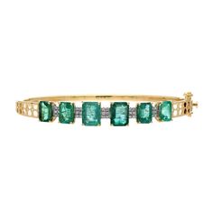 18k Solid Gold Emerald Diamond Bangle Bracelet 57x47 MM/ Prong Set Natural Gemstone Jewelry  Green Bracelet For Her/ Minimal Design Jewelry STONE DETAILS : ❋ Stone : Emerald ❋ Stone Size : Mix Size Approx. (± 0.20 MM) ❋ Stone Weight : 7.560 Cts. Approx. ❋ Stone Shape : Emerald Cut ❋ Stone Color : As Shown In Picture ❋ Stone Type : Natural ❋ Diamond Weight : 0.17 Cts. Approx. ❋ Diamond Shape : Round Cut ❋ Diamond Color & Quality : HI-SI ❋ Diamond Type : Natural METAL DETAILS : ❋ Metal Purity : So Classic Gemstone Bangle Jewelry, Fine Jewelry Bangle With 17 Jewels, Fine Jewelry Gemstone Cuff Bracelet For Formal Occasions, Formal Gold Bracelets With Gemstone Accents, Classic Gemstone Bangle Bracelet, Yellow Gold Bracelets With Jewels In Fine Jewelry Style, Wedding Bangle Bracelet With Gemstone Accents, Yellow Gold Diamond Bracelet With Gemstone Accents, Yellow Gold Bangle Bracelet With Gemstone Accents