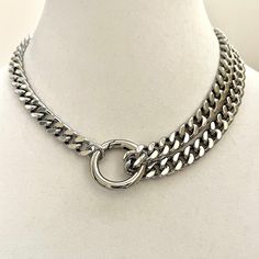 Silver Miami Cuban Chain Necklace is a high quality Cuban/Curb chain.  Chunky and thick. Great weight and sits beautifully around the neck.  The double strand on the one side makes this a very stylish and edgy piece of jewelry. The chain is approximately 9mm wide . The Spring Ring approximately 35mm Material: Rhodium plated brass  Lead safe and nickel free.  This is a very special piece  and a perfect gift for a friend, girlfriend, wife or even just for yourself:) Also available in Gold. Please check out the listing in my shop. Tips to keep your jewelry looking good. 1) Keep jewelry away from water and chemicals. 2) Remove during physical activities. 3) Store separately in a soft pouch or airtight box. 4) Avoid wearing to bed. 5) Gently polish with a soft, lint-free cloth to clean. PACKAGI Clear Sea, Boho Jewels, Cuban Chain Necklace, Sterling Necklace, Friend Girlfriend, Layered Necklaces Silver, Chunky Chain Necklaces, Miami Cuban, Sea Glass Necklace