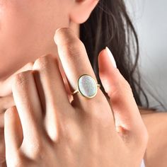 Opal Ring, Vintage Opal Ring, Minimalist Ring, Mother's Day Gift, October Birthstone Ring, Stacking Ring, Gift For Her Elevate any look with our Vintage Opal Ring. This minimalist piece exudes timeless charm, making it a perfect gift for Mother's Day or October birthdays. Crafted with care, its iridescent opal centerpiece adds a touch of elegance to any outfit. Stack it or wear it solo for understated luxury. A beautiful minimalist piece to have in ones collection 🎀 Free Returns and Money-back