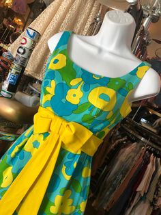 "Vintage Long Sleeveless Dress with Floral Yellow, Green and Teal Cotton Blend Dress Measurements 14\" Arm Opening 32\" Bust 24\" Waist 48\" Length in Back In good used condition. See all photos." Retro Multicolor Vintage Print Dress, Vintage Sleeveless Dress With Vibrant Print, Vintage Multicolor V-neck Mini Dress, Prom Purse, 1970s Green Floral Print Dress, Retro Vintage Floral Print V-neck Dress, Leisure Suit, Mexican Fashion, Beaded Evening Bags