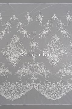 Are you searching for exquisite floral bridal lace, floral French lace, or off-white flower lace for your dream wedding gown? Look no further! Our collection features a stunning array of couture lace options that will elevate your wedding attire to new heights. Whether you desire a delicate floral pattern or a timeless design, our floral wedding lace with beautiful sequins is meticulously crafted to make your gown truly unforgettable. Explore our exclusive range of couture lace today and let you Elegant White Lace With Intricate Embroidery, Elegant Floral Embroidered Tulle Fabric For Ceremony, Elegant Wedding Embroidered Fabric With Lace Trim, Elegant Lace Embroidered Fabric For Wedding, Elegant Lace Embroidered Fabric For Ceremony, Elegant Cream Tulle Fabric For Wedding, Elegant Floral Embroidered Tulle Fabric, Elegant White Embroidered Fabric With Scalloped Lace, Elegant Cream Lace With Intricate Embroidery