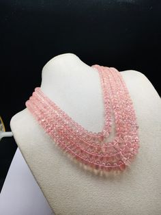 100% Natural Rose Quartz smooth rondelle shape beaded necklace with adjustable silk cord closure. Details: - Gemstone - Rose Quartz Shape - Rondelle Gross weight - 1073.75 carat Net weight - 1033.00 carat Length - Inner - 15 inches, Outer - 19 inches Calibration of beads - 8.00 millimeters till 14.00 millimeters SKU - HJSPSAR0033 100% NATURAL ROSE QUARTZ AMAZING NECKLACE UNIQUE NECKLACE PINK COLOR NECKLACE Thank you for your kind visit to my shop. NOTE: - You will receive the same product you se Pink Jewelry With Faceted Round Beads, Pink Faceted Beads Jewelry, Elegant Round Pink Crystal Necklace, Pink Polished Rondelle Beads Jewelry, Pink Round Gemstone Beads Jewelry, Pink Rondelle Jewelry With Polished Beads, Pink Rondelle Polished Beads Jewelry, Pink Round Gemstone Beads Necklace, Pink Round Gemstone Beaded Jewelry