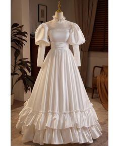 Get 10% off now! Buy vintage inspired bubble long sleeved satin wedding dress with collar at wholesale price online. Free shipping and pro custom service since 2009. Medieval Clothing Wedding Dress, Luxury Victorian Dress With Ruffles In Satin, Wedding Dress Peter Pan Collar, Victorian Wedding Dress Veaul, Elegant Wedding Dress With Collar, Luxury Vintage Dresses For Cosplay, Luxury White Elegant Victorian Dress, Luxury Ruffled Vintage Dress For Vintage Events, Luxury Victorian Satin Dress With Ruffles