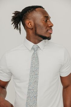 We pride ourselves in offering our customers some of the best skinny ties money can buy. Each DAZI tie is handmade from high quality imported fabrics. Features: Approx. 2.5" wide at the tip Approx. 58" in length 100% Cotton Fitted Cotton Suit And Tie Accessories, Dapper Fitted Tie, Dapper Standard Tie, Dapper Fitted Standard Tie, Fitted Cotton Tie, Classic Fitted Cotton Neckwear, Dapper Fitted Neckwear For Semi-formal Occasions, White Business Ties, Semi-formal Summer Standard Tie