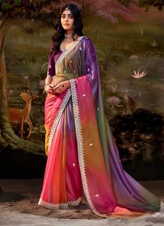 This Bollywood style multi-color saree is crafted with fancy fabric and features a shaded design with patch border embroidery and sequins work. Perfect for ceremonial gifts, this saree offers a unique and elegant look for women. The unstitched blouse can be customized upto 44 inches. Do Note: All the accessories shown are for styling purpose only. Slight color variation may occur due to photographic reasons. Fall and Pico : Done Draping Saree(Ready to wear) : On Request Extra Charges Occasion : Naagin 6 Tejaswi Prakash, Shaded Saree, Fancy Fabric, Indian Party, Bollywood Style, Fancy Blouses, Embroidered Wedding, Organza Saree, Work Sarees