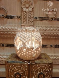 an owl lamp is sitting on top of a wooden box with the words owl above it