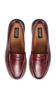 Rich leather elevates a handsome loafer styled with a moc toe and low heel that will lend a timeless sophistication to your office style. Leather upper and lining/rubber and leather sole Imported Classic Burgundy Dress Shoes With Rubber Sole, Classic Burgundy Oxfords With Brogue Detailing, Classic Burgundy Dress Shoes With Plain Toe, Classic Burgundy Oxfords With Plain Toe, Classic Burgundy Wingtip Oxfords, Classic Burgundy Oxfords For Business, Classic Burgundy Leather Shoes For Semi-formal Occasions, Classic Burgundy Wingtip Dress Shoes, Classic Burgundy Loafers With Rubber Sole