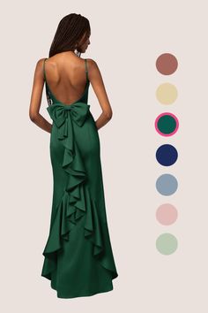 This stretch satin floor length dress features a straight neckline, adjustable spaghetti straps, a bow back, a ruffle design, and a mermaid skirt. Elegant Green Mermaid Bridesmaid Dress, Elegant Green Bridesmaid Mermaid Dress, Fitted Prom Gown With Bow Tie Back, Tiana Blue Dress, Peacock Color Dress, Prom Trends, Dark Green Bridesmaid Dress, Dark Navy Bridesmaid Dresses, Prom Inspiration