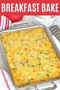 a casserole dish with cheese and vegetables in it on a red and white towel