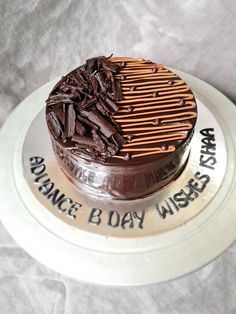 there is a chocolate cake on top of a plate that says substance & boy wishes