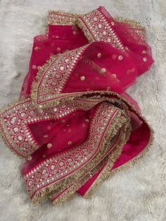 This is a Wedding Dupatta Red Color  made on orders. It is made using dyeable net fabric with pearl work all over.  We stitch beautiful brides lace to all sides of it. Dupatta is having a length of 100 inches and width of around 40 inches. I don't keep it readymade I only make it exclusively for my customers. Can be fully customised. Bride Dupatta Designs, Nida Lehenga With Dupatta For Eid, Wedding Kundan Sharara With Dupatta, Wedding Anarkali Set With Dupatta In Chinon, Festive Sharara With Dupatta In Nida, Bollywood Style Sharara With Dupatta In Chinon, Nida Sharara With Dupatta For Wedding, Nida Sharara With Dupatta For Diwali, Wedding Sharara With Dupatta In Nida