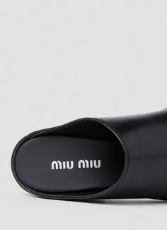 Leather in a smooth grain finish Open toe Block heel Made in Italy 100% Leather Color: Black Code: 5XX620 3AQP F0002 SKU: miu0252033blk Our Products Are 100% Genuine. In All Cases We Stand By The Authenticity Of Every Product Sold On Our Site. Miu Miu Open Heel Leather Heels, Miu Miu Black Shoes, Miu Miu Heels Black, Miu Miu Black Heels With Heel Strap, Black Flat Heel Mules, Medium Width, High Heel Mules, Heel Mules, Womens High Heels, Miu Miu