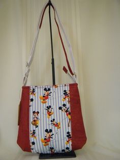 Fun Cross body bag, features cotton print and red cork exterior. Top of bag has a zip closure Lining of bag is cotton print with zip pocket Measures 10 1/2" x 9" x 2" Comfortable white cotton web strap adjustable from (approx) 29" - 52" Cute Mouse, Winter Garden, Cross Body Bag, Body Bag, Cross Body Handbags, Purses And Handbags, White Cotton, Cross Body, Crossbody Bags