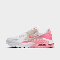 a white and pink nike air max sneakers