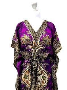 Purple Amethyst Kaftan Dress by Festival StallThis beautiful free size dress will fit:UK 8 10 12 14 16 18US 4 6 8 10 12 14 This beautiful soft touch very lightweight Kaftan dress is great for a relaxed summer look, party, or occasion. drawstring at the waist fit a great fit. Dress it up or dress it down! It is long long length, with v-neck line. Ideal for popping into the suitcase , dress it up with some big bling jewellery for the ultimate boho look. Measurements:Length from nape of neck to hem Purple V-neck Beach Dress For Summer, Purple Printed Dress For Vacation, Purple Printed Summer Maxi Dress, Purple V-neck Maxi Dress For Festival, Purple Printed Vacation Dresses, Summer Purple Printed Maxi Dress, Purple Long Dress Beach Cover-up, Free Size Bohemian Purple Dress, Purple Short Sleeve Maxi Dress For Summer