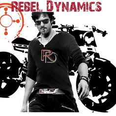 a man standing in front of a motorcycle with the words rebel dynamics on it