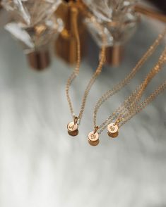 The no-stress way to dress your entire bridal party—curated by us, discounted for you! This bridesmaid jewelry set includes your choice of up to seven Personalized Yue Necklaces crafted in one chosen metal, each with their own initial. These are pieces they’ll love on your wedding day and wear all the days after—meaningful gifts and timeless looks all in one. Each necklace arrives packaged separately in our sleek new gift-ready boxes, with letterpress cards to fill out at home. To order, select Delicate Charm Necklaces For Bridesmaid Gift, Minimalist Rose Gold Jewelry With Initials, Elegant Adjustable Name Necklace With Delicate Chain, Elegant Name Necklace With Delicate Adjustable Chain, Rose Gold Sterling Silver Charm Necklaces For Wedding, Rose Gold Sterling Silver Charm Necklace For Wedding, Wedding Charm Necklace In Rose Gold And Sterling Silver, 14k Gold Round Pendant Charm Necklaces For Wedding, 14k Gold Round Pendant Charm Necklace For Wedding