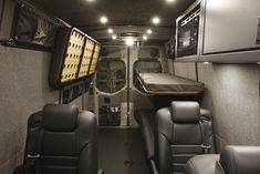 the inside of an rv with leather seats