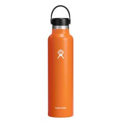 an orange hydro flask water bottle on a white background