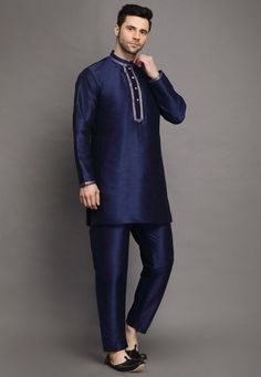 Art Silk Kurta in Navy BlueThis Readymade attire is Enhanced with Buttons. Crafted in Chinese Collar Neck and Full SleeveAvailable with an Art Silk Pajama in Navy BlueDo note: Footwear shown in the image is for presentation purposes only. Half to one inch may vary in measurement. (Slight variation in actual color vs. image is possible) We sell all kinds of menswear. Mens Kurta | Mens Kurta Pajama | Mens Sherwani | Mens Sherwani Sets | Traditional Menswear | Partywear Menswear | Indian Mens Dress Blue Silk Sets For Diwali, Blue Silk Set For Diwali, Blue Silk Set For Navratri, Silk Blue Kurta With Resham Embroidery, Blue Silk Kurta With Zari Work, Silk Kurta With Resham Embroidery In Blue, Blue Silk Kurta With Resham Embroidery, Traditional Blue Silk Kurta, Blue Silk Kurta For Festive Occasions