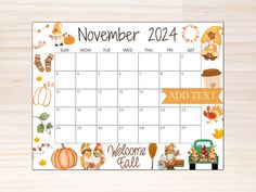 the november calendar is shown on a wooden surface with fall leaves and pumpkins around it