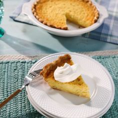 a slice of pie sitting on top of a white plate