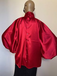 "This is a very stylish Womens Satin blouse in beautiful Candy apple red color. It is comfortable and cozy. Made for a free flowing fit. Great for all year around and for any special occasion or casual day can be dressed up or dressed down. SIZE CHART SIZE S - US 6, UK 8, EU 36 bust: bust around 34.5\"/90cm Waist: waist around 27.5\"/70cm Hips: hips around 34.5\"/90cm SIZE M - US 8, UK 10, EU 38 bust: bust around 37.5\"/95cm Waist: waist around 29.5\"/75cm Hips: hips around 37.5\"/95cm SIZE L - Apple Red Color, Satin Bow Blouse, High Neck Shirt, Blouse High Neck, Black Satin Blouse, Bishop Sleeve Blouse, Victorian Collar, High Neck Shirts, Blouse Plus Size