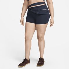 French fashion designer Simon Porte Jacquemus reunites with Nike to create a one-of-a-kind collection. Soft, smooth and stretchy—these modish shorts keep you feeling comfortable and confident. The wraparound waist includes a small pocket and metal hardware, adding a polished and practical finish to your asymmetrical look. Nike Jacquemus, Nike X Jacquemus, Simon Porte Jacquemus, Layered Short, French Fashion Designers, Sneaker Release, Latest Sneakers, Women Lifestyle, Best Sneakers