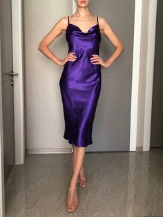 This silk satin slip dress can be worn as a bridesmaid dress, party and date dress and for many other occasions. Made of satin silk. DESCRİPTİON:  -Adjustable straps.  -Designed for a slim but relaxed fit.  -Unlined. İt is a custom made dress, tailored according to your preferences, you can choose the length of the dress and order it with or without cut on the side. While ordering write your bust, waist and hips measure, so the dress will be made to your size. Please enquire if you're interested in different color. SIZING INFO: XS/34/US4: bust: 82-86cm (32-33 inch) waist 64-66 cm (24-25 inch)  S/36/ US6: bust: 86-88cm (33-34 inch) waist: 66-68 cm (25-26 inch) M/38/ US8: bust: 88-92 cm (34-36 inch) waist: 68-72 cm (26-28 inch) L/40/ US10:  bust: 92-94 cm (36-37 inch) waist: 72-74 cm (28-29 Elegant Purple Dress With Satin Finish, Elegant Purple Satin Finish Dress, Fitted Purple Satin Prom Dress, Fitted Purple Satin Dress For Prom, Purple Silk Satin Evening Dress, Formal Fitted Purple Slip Dress, Purple Satin Finish Dress For Formal Occasions, Formal Purple Satin Finish Dress, Purple Silk Evening Slip Dress