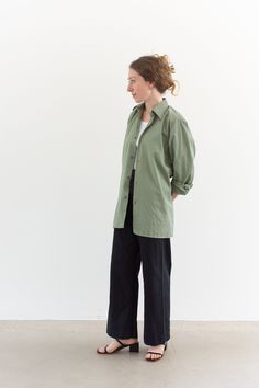 "Sage green shirt with button closure, pointed collar, buttons at cuff. The color is the loveliest sage.  Maker: Military  |  Material: feels like cotton poly blend. a bit of sheen.  Condition: Excellent. Deadstock. SMALL-MEDIUM:  Shoulders: 17\"  |  Chest: 21\"  |  Length: 29\"  |  Sleeve: 23.5\" Elizabeth is 5'5\" and wears Small in tops.  SHOP http://www.rawsonstudio.etsy.com FOLLOW US + instagram | @_rawson + pinterest | rawson *No Returns. Items are eligible for store credit only. We ask th Simple Button Up Outfit, Everyday Khaki Shirt With Buttons, Everyday Khaki Shirt, Khaki Collared Cotton Blouse, Collared Cotton Blouse In Khaki, Khaki Cotton Collared Blouse, Green Everyday Shirt With Buttons, Olive Long Sleeve Cotton Shirt, Green Button-up Blouse With Button Cuffs