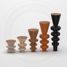 an assortment of wooden candlesticks in various shapes and sizes on a white background