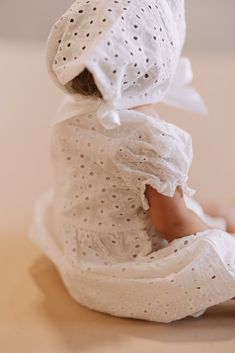 Dress your little one in the cutest and most comfortable outfit for their special day with the Erin Blessing Dress. Made with 100% cotton eyelet fabric, this white dress and head bonnet set is perfect for any baby blessing ceremony. Say hello to the most adorable blessing outfit! 100 Cotton Baby Blessing Dress, Blessing Ceremony, Bridesmaid Tops, Baby Baptism Dress, Blessing Dress, Temple Dress, Baby Blessing, Comfortable Outfit, Temple Wedding