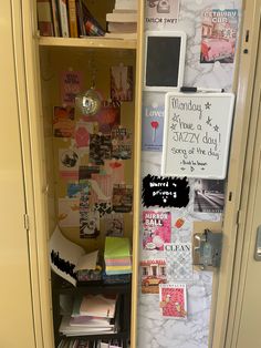 a bookcase with many books and papers on it, next to a locker full of other items