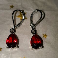 Simulated Ruby Red Drop Earrings In Sterling Silver Classic Red Ruby Earrings, Silver Ruby Teardrop Earrings, Luxury Silver Ruby Earrings, Exquisite Silver Ruby Earrings, Elegant Ruby Earrings Nickel-free, Amethyst Studs, Mother Of Pearl Earrings, Bow Earrings, Stone Gold