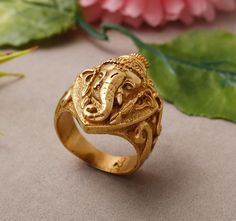 "Lord Ganesha Ring, Handmade ring, Gold Ring, Statement ring, Religious Bass Ring, Vinayak ring, Unique ring, Personalized gift, Dainty ring ♥ SIZE:- All Size Are Available, Choose From Variation. ♥ METAL:- Brass ♥ BRASS SPECIALTY ♥ Brass is known for its strength and durability. However, it is also very malleable, making it ideal for shaping into intricate jewelry designs. Brass does not rust and is resistant to corrosion. However, it does develop a patina, or greenish layer, over time. Enjoy F Luxury 22k Gold Traditional Rings, Balaji Rings For Men, Handmade Temple Jewelry Style Round Ring, Yellow Gold Temple Jewelry Rings As Gift, Intricate Design Rings For Festivals And Gifts, Intricate Design Rings For Festivals Gift, Gold Rings Suitable For Festivals Or Gifts, Gold Rings For Festivals, Rings With Intricate Design For Festivals