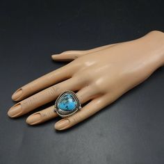 "VINTAGE NAVAJO RING DESCRIPTION: With a breathtaking specimen of blue Morenci turquoise, this ring will be a treasured addition to your collection of fine vintage Native American jewelry. MEASUREMENTS: Ring face measures 1 1/8\" x 1 1/8\" Cabochon measures 18mm x 17mm RING SIZE: 6 1/4 WEIGHT: 13.8 grams SIGNED: no STERLING: unmarked, verified sterling silver" Bohemian Untreated Blue Turquoise Ring, Collectible Untreated Blue Turquoise Ring, Southwestern Style Untreated Blue Turquoise Ring, Western Style Turquoise Gemstone Rings, Southwestern Style Cabochon Rings, Collectible, Southwestern Style Cabochon Ring Collectible, Western Style Turquoise Ring Collectible, Bohemian Turquoise Ring With Gemstone, Bohemian Blue Turquoise Ring With Gemstone