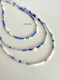 "Dainty Blue beaded necklaces with fresh water pearles and gorgeous royal blue beads in \"old money\" style.   Made with delicate high quality Czech glass seed beads. Get for yourself or gift to a friend. ♥   #vichkin #vichkindesign ↠ ABOUT    ▢  Size: about 15 inch, goes up to about 17 inch with chain extension.  ▢  Materials: 2mm / 3mm quality Czech glass seed beads  ▢  This item is handmade and may vary slightly from the picture, making every one completely unique.  ▢  Ready to ship. ↠ IMPORTANT The product is not suitable for young children. Please exercise child  Please check out my Jewelry Collection here: https://www.etsy.com/ca/shop/Vichkin?ref=seller-platform-mcnav§ion_id=22731346 Back to main page https://www.etsy.com/ca/shop/Vichkin All my items are handmade with love ♥  Natalie Summer Seed Bead Necklace, Boho Ocean, Beaded Chocker, Coastal Granddaughter, Blue Beaded Necklace, Old Money Style, Blue Beach, Summer Necklace, Fancy Jewelry